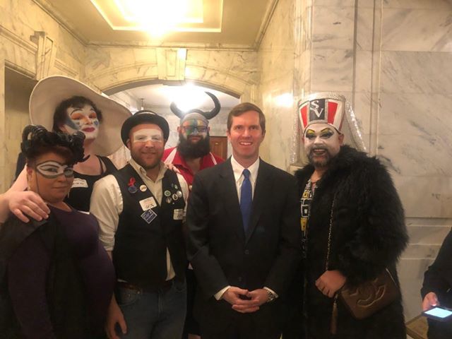 Kentucky governor defends photo posing with drag queens at gay rights rally